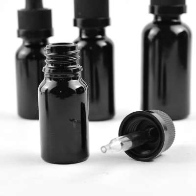 Custom spray matte black glass dropper bottle bamboo child resistant screw cap frosted clear boston bottles with pipette