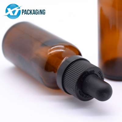 child resistant 2oz amber glass bottle jars and packaging amber glass bottles with dropper