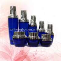 Glass container empty cosmetic packaging bottle 100ml color lotion bottle/ serum bottle with aluminum pressure pump caps